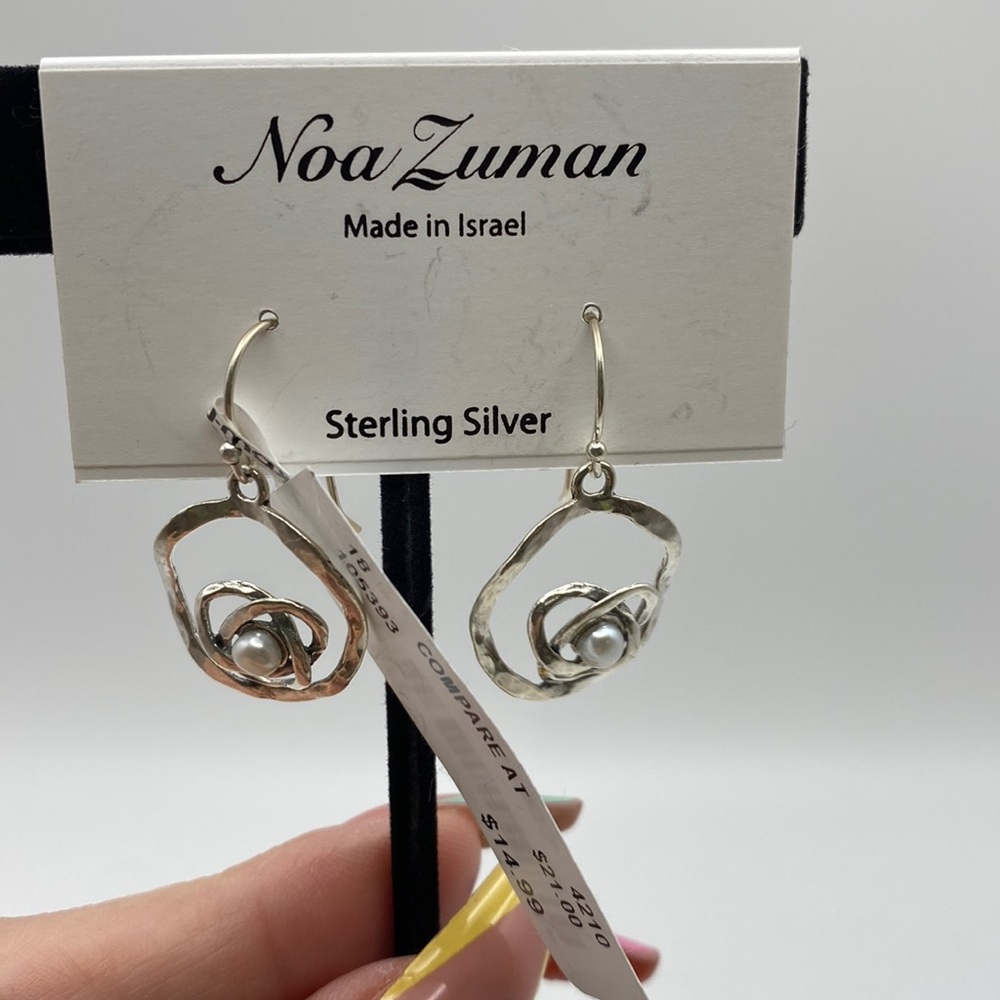 Sterling, silver earrings, pearl in the center